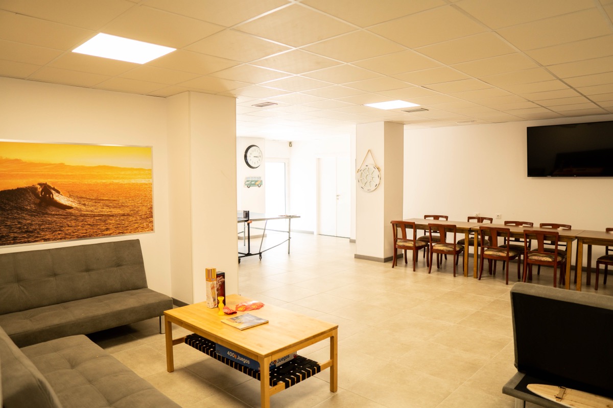 Sofa in the shared common room of the hostel